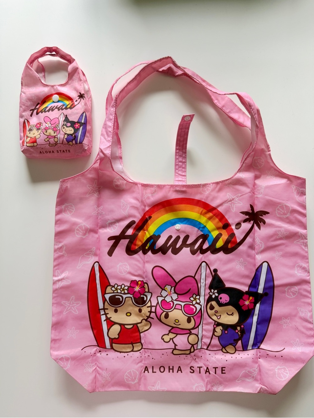 sanrio hawaii aloha state hello kitty and friends pink foldable tote bag